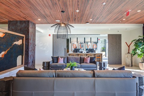 a living room with a couch and a table